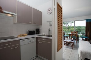 The kitchen comes equipped with everything you need.