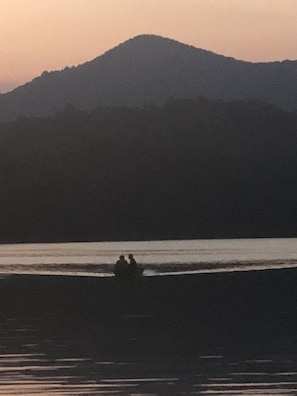 My son and his friend coming home after fishing at sunset(a neighbor took this).