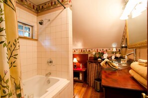 Sparkling Bathroom with Jacuzzi Tub. Private bathroom for the suite!