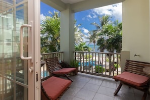 Private patio with beautiful pool, beach and ocean views