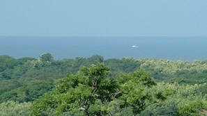 View from the living room - a boat in the Pacific Ocean about two miles away