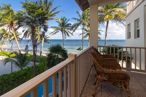 Patio view of pool, beach and ocean