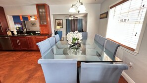 Enjoy your meals with your loved ones in this elegant dining area.