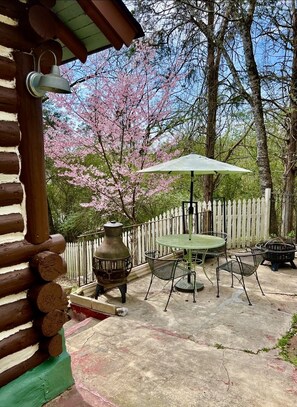 Patio area with fire pit and Chimenea. Smoking is allowed in the patio areas.