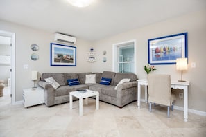 Family Room with oversized, comfy sectional and Flat Screen TV.