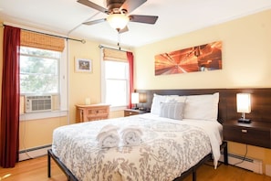 Bedroom with ceiling fan and A/C