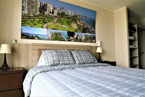 Deluxe Master Bedroom with Smart TV.