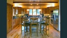 gourmet hickory kitchen with cooktop granite