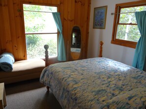 Master Bedroom. Monet theme. 4 post queen bed, chaise lounge, swivel mirror.