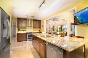 Chef's Kitchen is well stocked. Island seating, 2 prep areas, 2 dishwashers, TV.