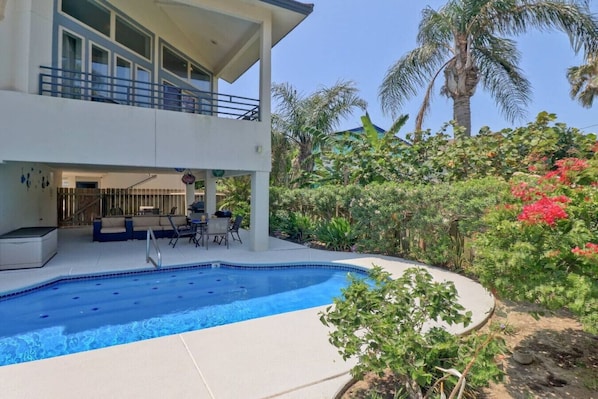 Unit #2 overlooks the pool and garden area