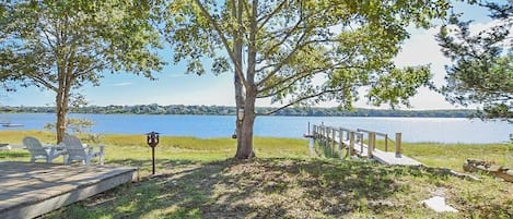 Cove view with dock and Adirondack chairs