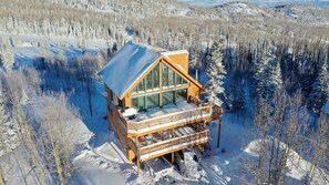 Overhead view of cabin after big snow storm.  Paradise Run behind cabin