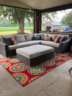 Outdoor Screened Patio w/ fire table  heaters bar tv and couch pit 