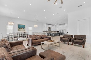 Crisp Lines Meet Beachy Feel in this Massive First Floor Living Space