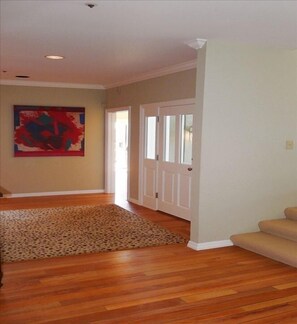 Gorgeous hardwood flooring throughout. Open floor plan.