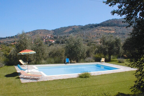 Water, Sky, Plant, Swimming Pool, Mountain, Shade, Rectangle, Tree, Land Lot, Outdoor Furniture
