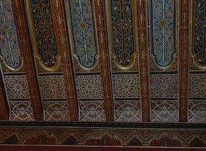 Restored 200 year old lounge ceiling. Cedar wood inlaid with precious metals