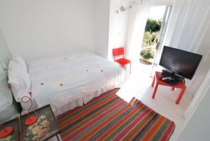 2nd bedroom opens to flower garden