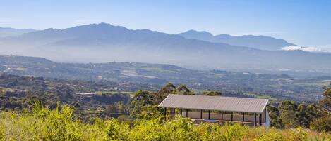 View of our condo building with beautiful mountains in the background.