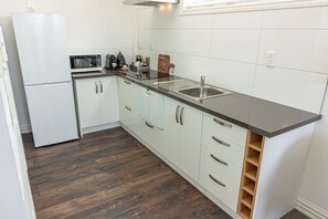 Kitchen with all essentials including dishwasher (NO OVEN)