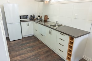 Kitchen with all essentials including dishwasher (NO OVEN)