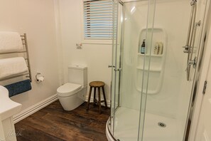 Modern bathroom with essentials. Washing machine
