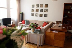 Open living room and study overlooks quiet square