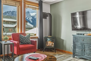 Cozy up to Natural Gas fireplace. South-facing mountain views. 