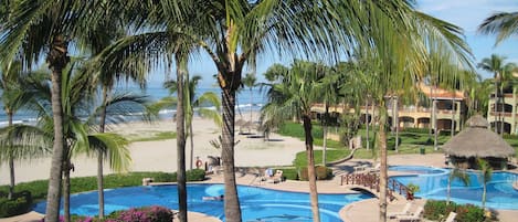 From your balcony see the pool and hot tub and they lead right onto the beach.