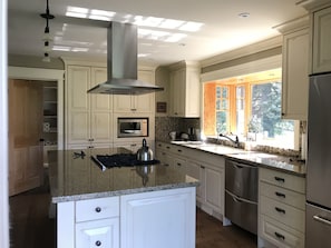 Gourmet kitchen with access to the laundry room