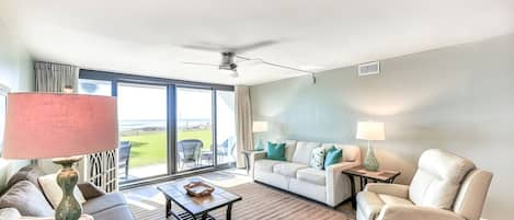 Living room with an ocean view. Ground floor makes the pool or beach a quick trip.