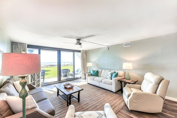 Living room with an ocean view. Ground floor makes the pool or beach a quick trip.