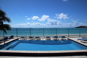 A great view of beautiful white sandy beach and aqua marine ocean!