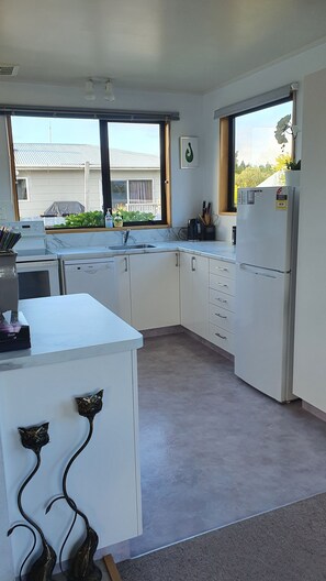 Fresh kitchen with dishwasher