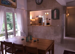 Dining with access to rear terrace