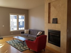 Main floor living room with fireplace