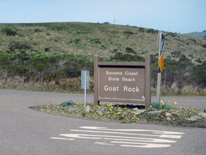 Look for this state beach park sign and enter to reach property inside.