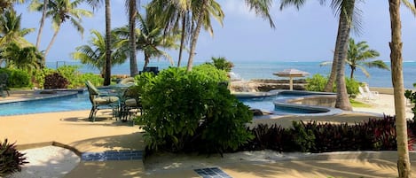 Your view from the patio - Ocean front condo steps from the beach.