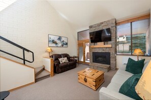 Park Avenue 212-gas fireplace in the well appointed living room