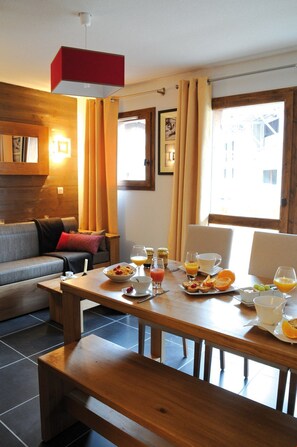 Settle into the dining area and enjoy a nice meal.