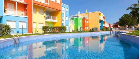 Water, Building, Sky, Property, Plant, Swimming Pool, Azure, Tree, House, Condominium