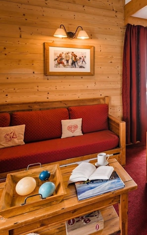 Sit back and relax on the comfy sofa after a day outside.
