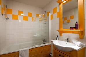 Get ready for your day in the lovely bathroom.