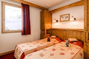 Drift to sleep in the 2 Single beds in the bedroom.