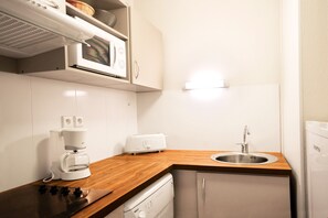 Prepare snacks and small meals in the kitchenette.