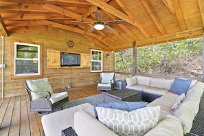 Covered Deck Area with lights with TV, Giant Jenga, children's swings, and more.