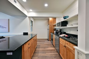 Full kitchen with dining area