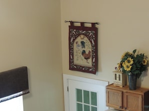 A view of the decor in the dining and kitchen area.