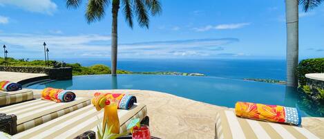 Private resort paradise! Sip poolside while you soak up some Hawaiian sunshine 